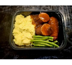 Home made beef olives stuffed with sausagemeat with mashed potatoes, green beans and our signature gravy.